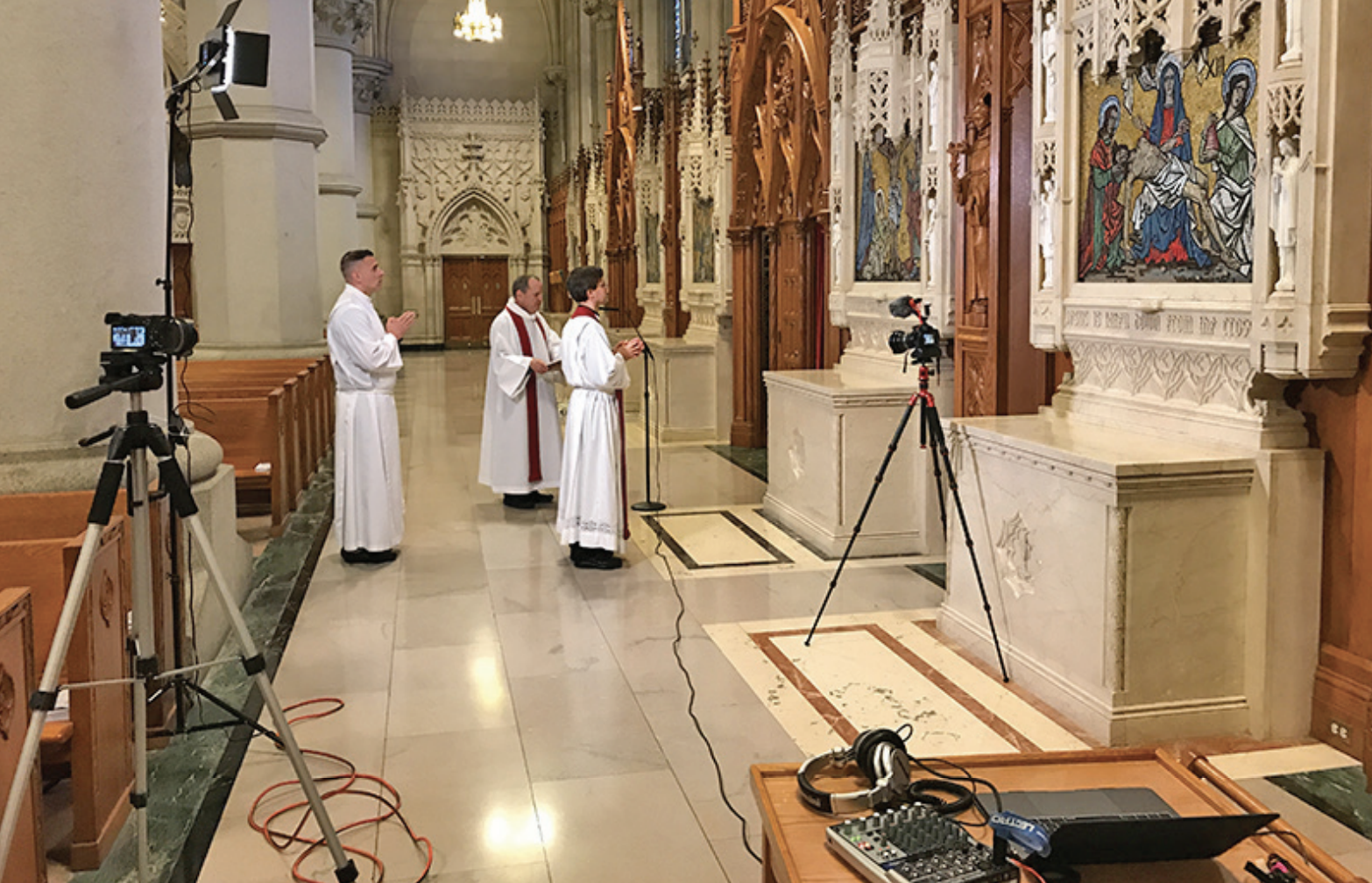 From left, seminarian Lynx Soliman, Bishop Manuel Cruz and Father John Barno participate in a video production of the Stations of the Cross at the Cathedral Basilica of the Sacred Heart in Newark. It was based on “The Way of the Cross” with reflections from Cardinal Tobin inspired by St. Alphonsus Liguori. (Photo by Jai Agnish/Archdiocese of Newark)