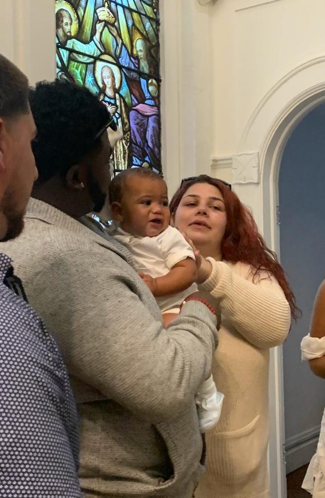 Lexi and her boyfriend Tyrelle with son Jayceon at Mercy House in Newark during his baptism.