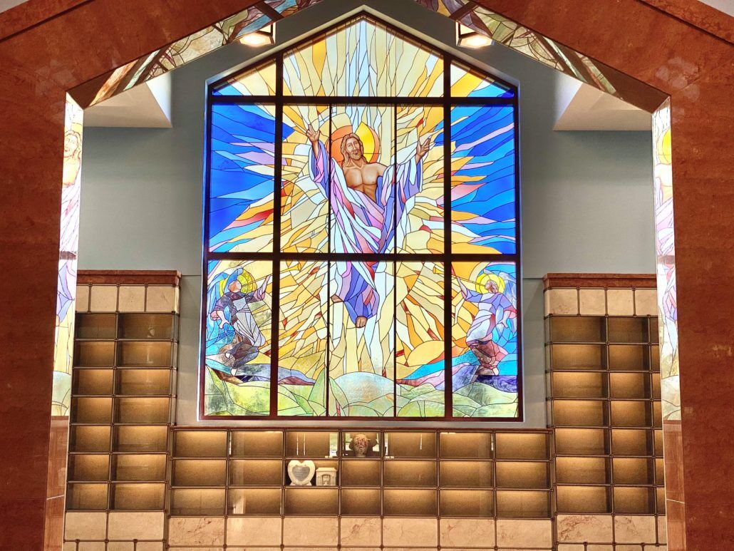 A stained glass image of the Ascension of the Lord at Saint Gertrude Cemetery and Chapel Mausoleum of the Resurrection in Colonia, N.J. (Courtesy of Catholic Cemet