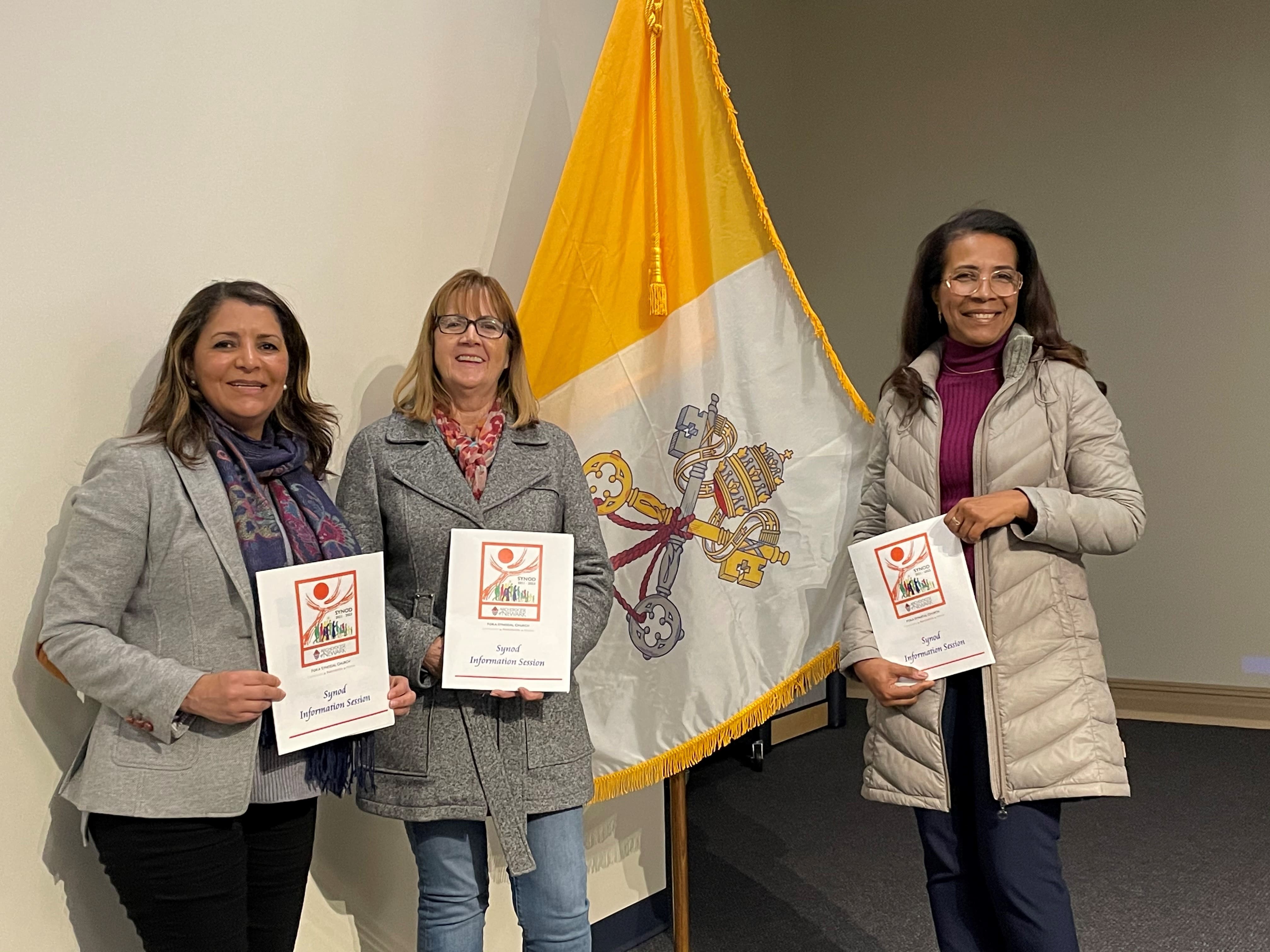 Synod coordinators from St. James, Newark, and Holy Trinity-Epiphany, Newark attend an Information Center at the Youth Center in Kearny: Edilaine Candida and Silvia Peixoto (St. James Parish, Newark) and Ana Goncalves Holy Trinity - Epiphany Parish, Newark. (Photo courtesy of Sister Donna L. Ciangio, O.P.)