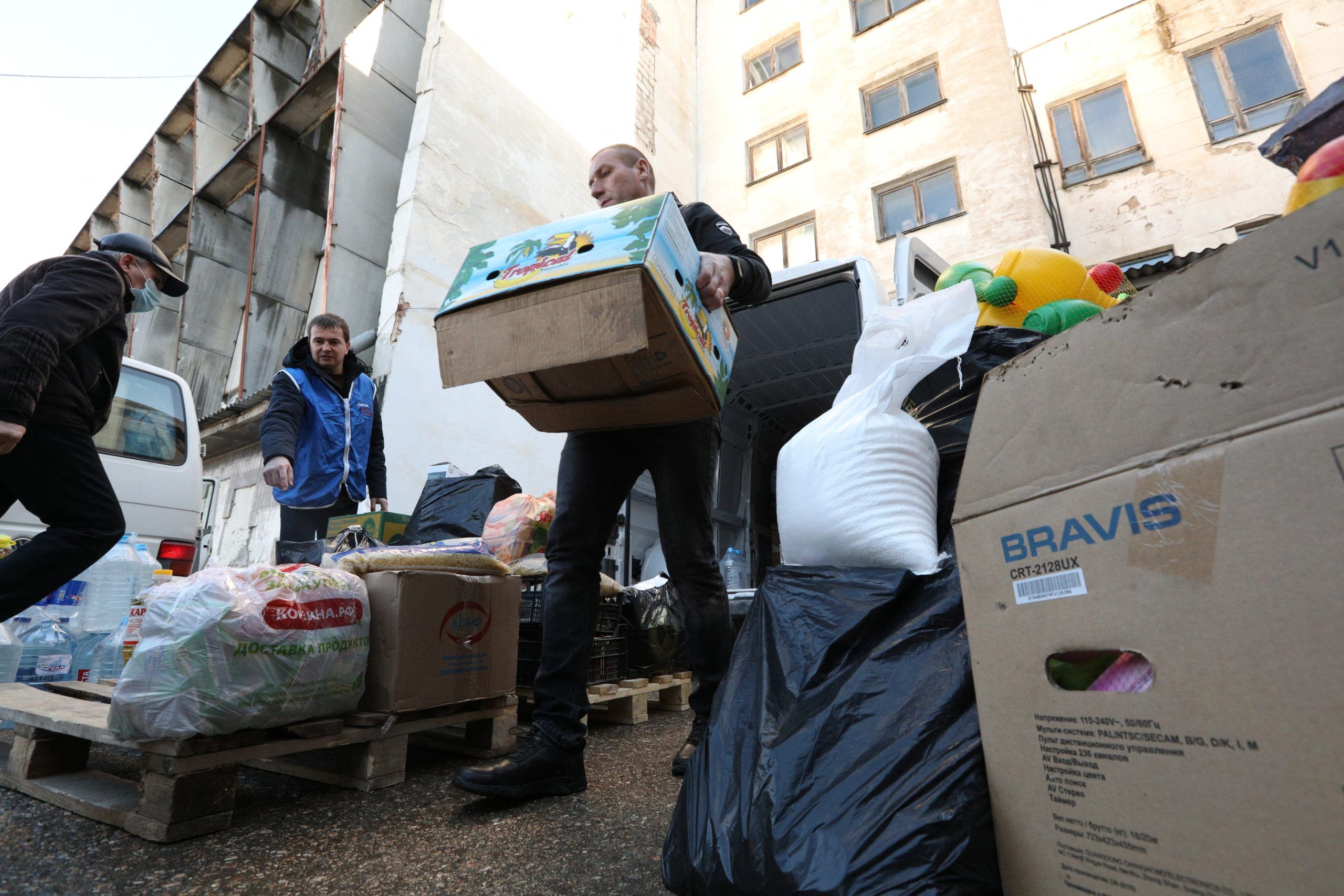 Humanitarian aid for evacuees from the separatist-controlled regions of eastern Ukraine is gathered and packed in Simferopol, Ukraine, Feb. 21, 2022. (CNS photo/Alexey Pavlishak, Reuters)