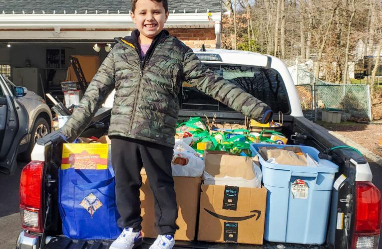 Boy launches food drive to feed and clothe underprivileged