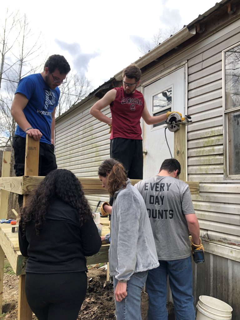 Students from Stevens Institute of Technology in Louisa, Ky., during a Spring break mission trip with the Father Beiting Appalachian Mission Center. (Photo courtesy of Dan Apadula)