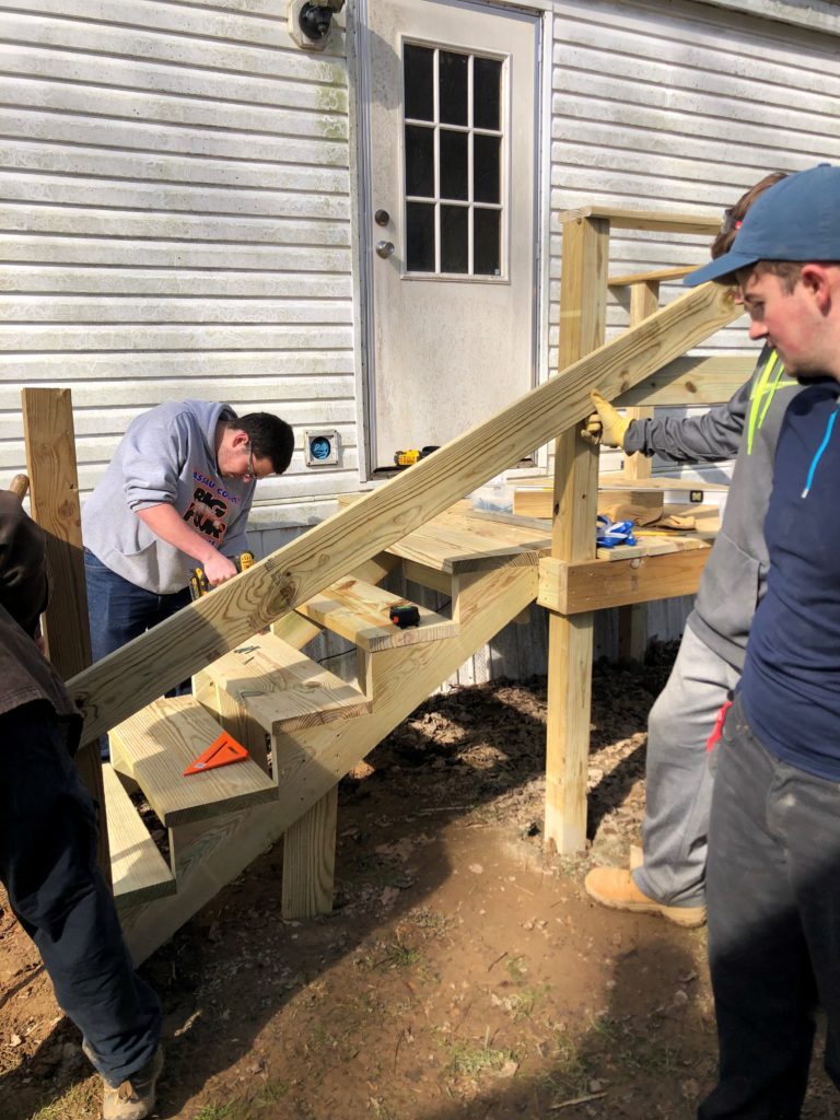 Students from Stevens Institute of Technology in Louisa, Ky., during a Spring break mission trip with the Father Beiting Appalachian Mission Center. (Photo courtesy of Dan Apadula)
