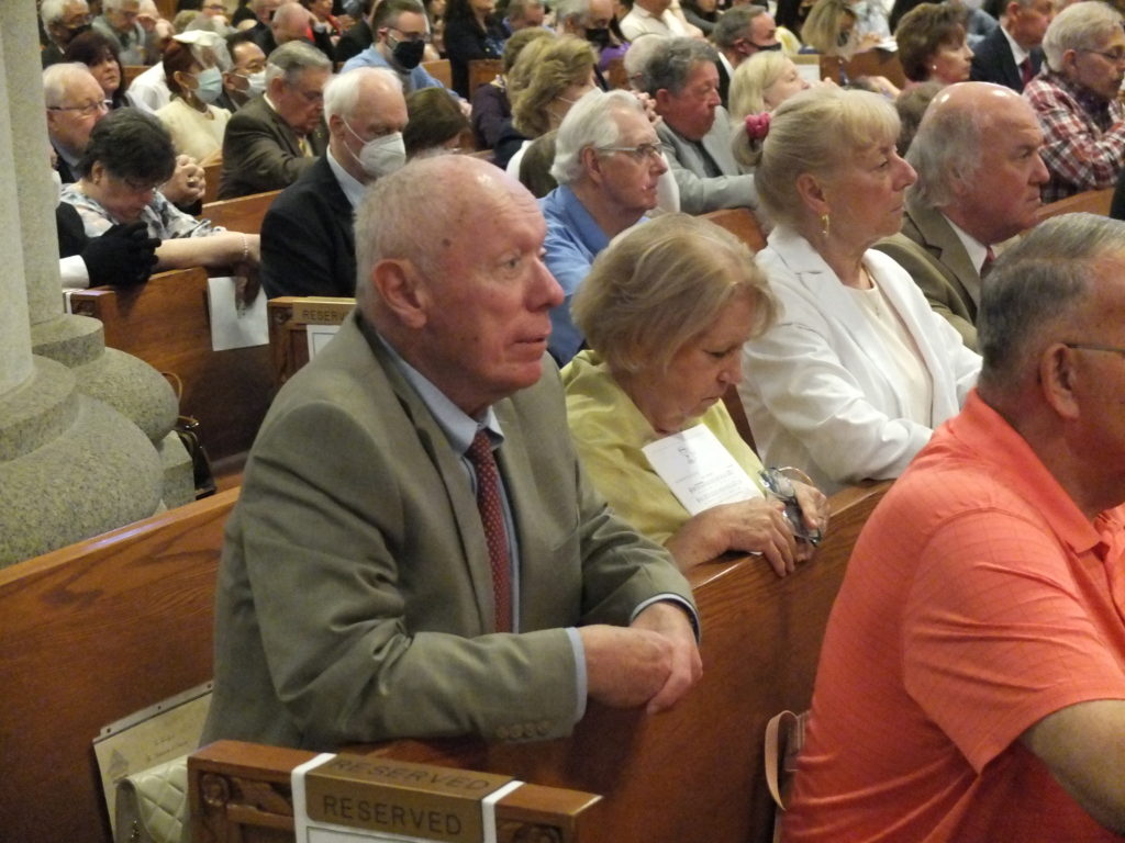 Bob and Anne Wischusen, who live in Garwood and are long-time parishioners and volunteers at St. Helen in Westfield, commemorated their 50th wedding anniversary at Newark’s Cathedral Basilica of the Sacred Heart on May 15, 2022. They were among 150 couples blessed by Cardinal Joseph W. Tobin, C.Ss.R., archbishop of Newark. It was the first time the Golden Anniversary Mass was held since the COVID-19 pandemic began. (Photo courtesy of Sean Quinn/Archdiocese of Newark)