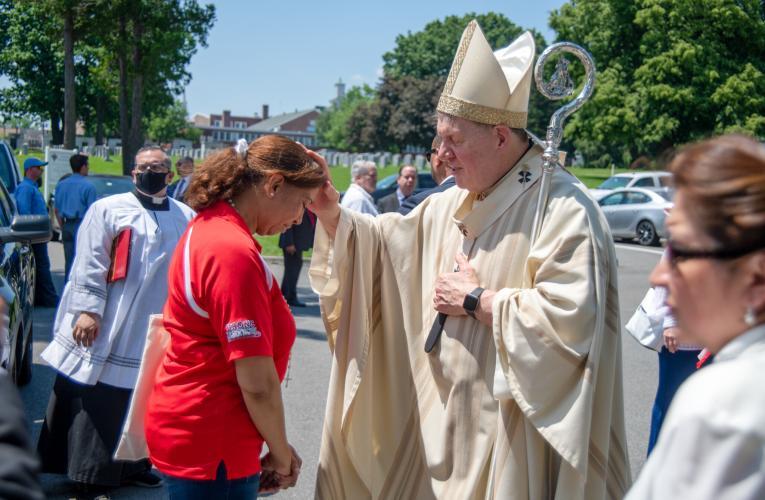 Faithful return to in-person Memorial Day Masses at Catholic cemeteries
