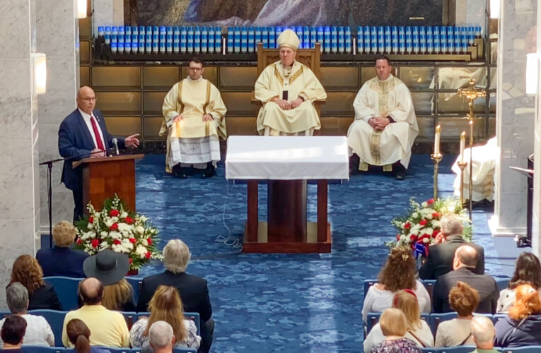 Hundreds honor veterans at Catholic cemeteries as cardinal blesses newly opened chapel