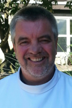 A headshot of Sean Manson.