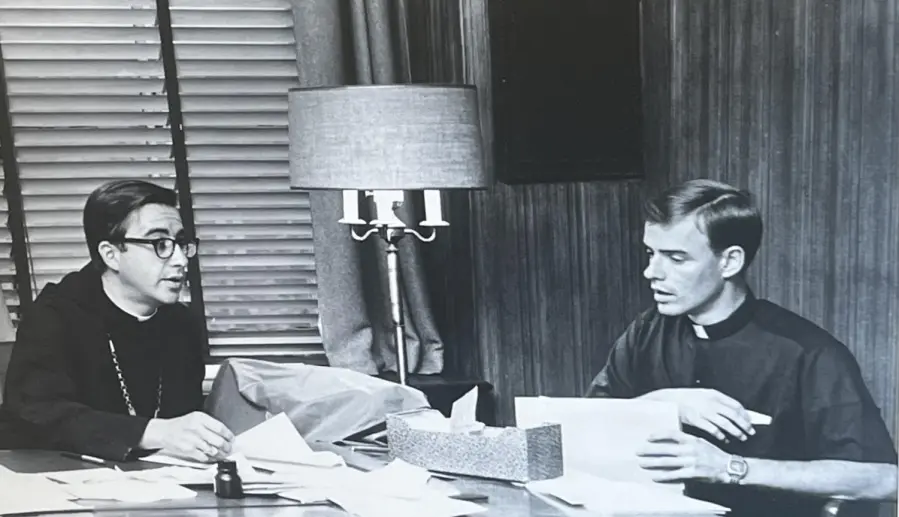 Former Abbot Melvin Valvano ’56, O.S.B. sat with Father Edwin Leahy ’63, O.S.B.