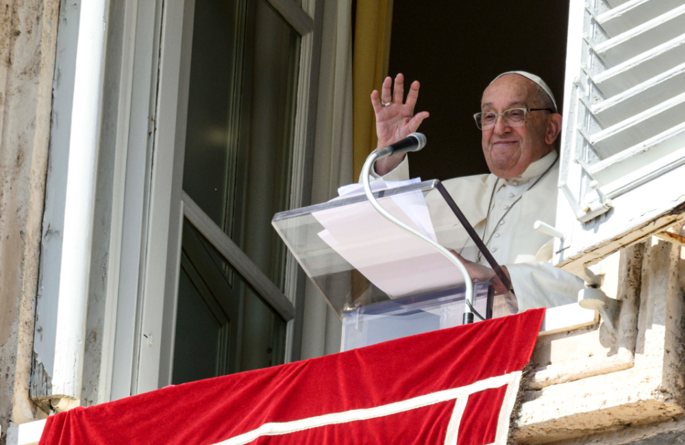 Pope Francis waves to visitors gathered in St. Peter's Square at the Vatican Oct. 6, 2024, for the midday recitation of the Angelus. At the end of the Angelus, the pope announced he would create 21 new cardinals Dec. 8. (CNS photo/Vatican Media)