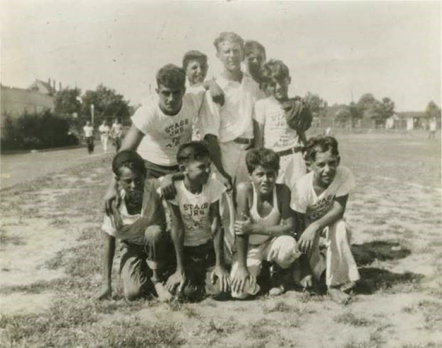Yogi Berra with his childhood sandlot team, the Stags, alongside his lifelong friend and fellow MLB player, Joe Garagiola.