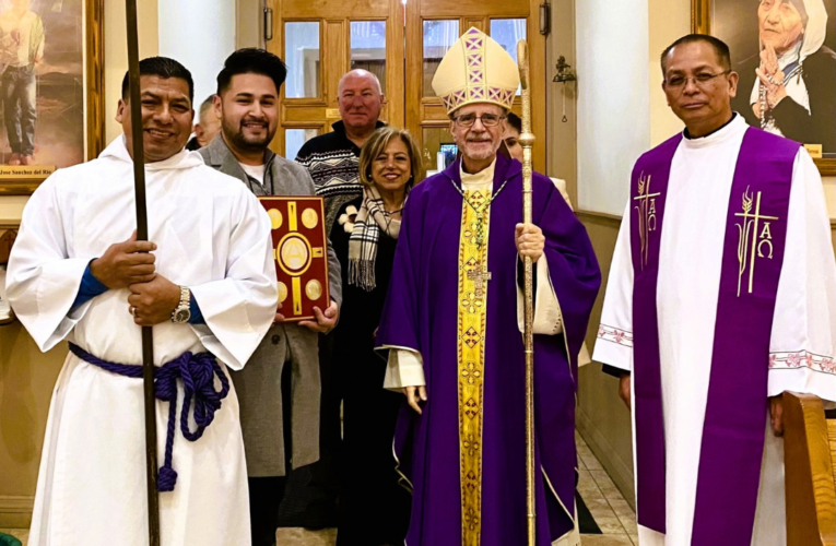 Catholics mark start of Advent with wreath lightings, prayer, and service