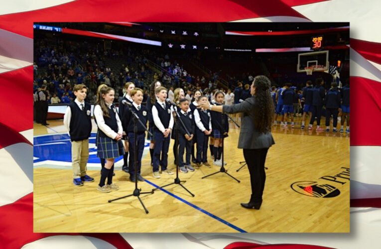 Sights & Sounds: Archdiocesan students sing National Anthem at Prudential Center