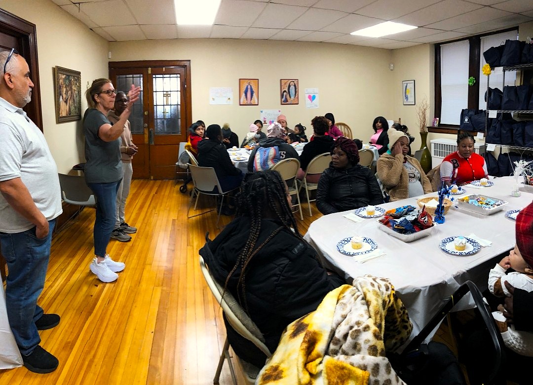 Cheryl Riley addresses Mercy House baby shower guests