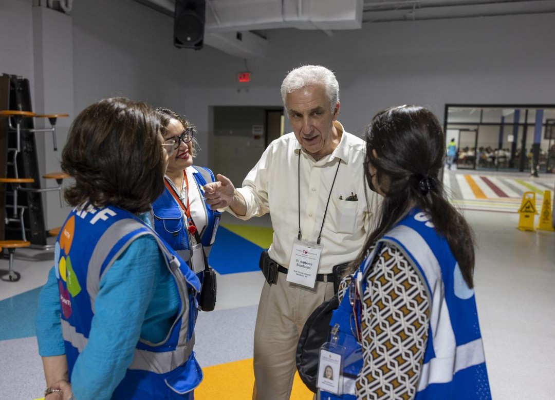 Father Anthony Randazzo with volunteers during a Catholic Extension Society Mission Immersion Program