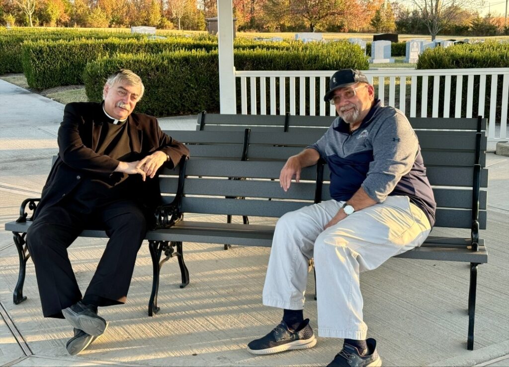 Father Gabriel Costa and Larry Berra