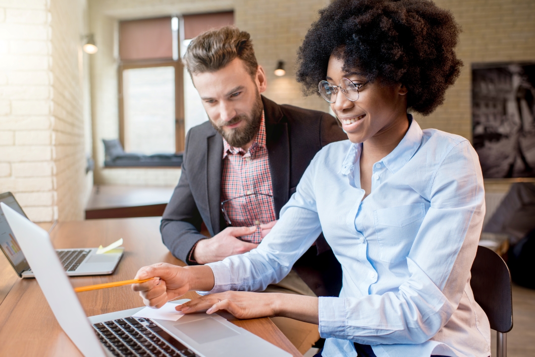 Two people working