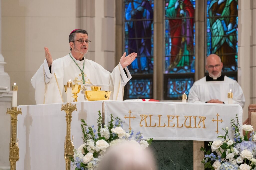 Bishop Elias Lorenzo, auxiliary bishop of the Archdiocese of Newark, celebrates Mass as Several Sources begins renovation of its original house location.
