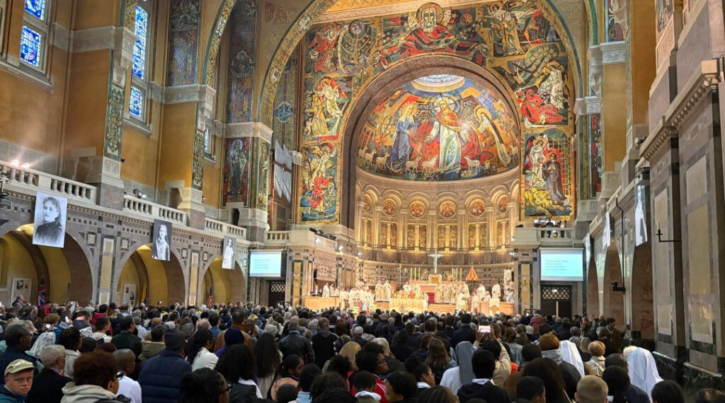 Prayer vigil Lisieux France St Therese canonization anniversary