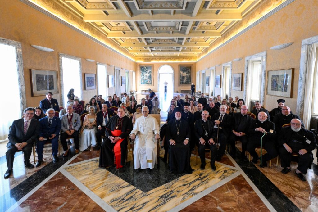 Pope poses with Cardinal Tobin, Archbishop Elpidophoros and pilgrimage group