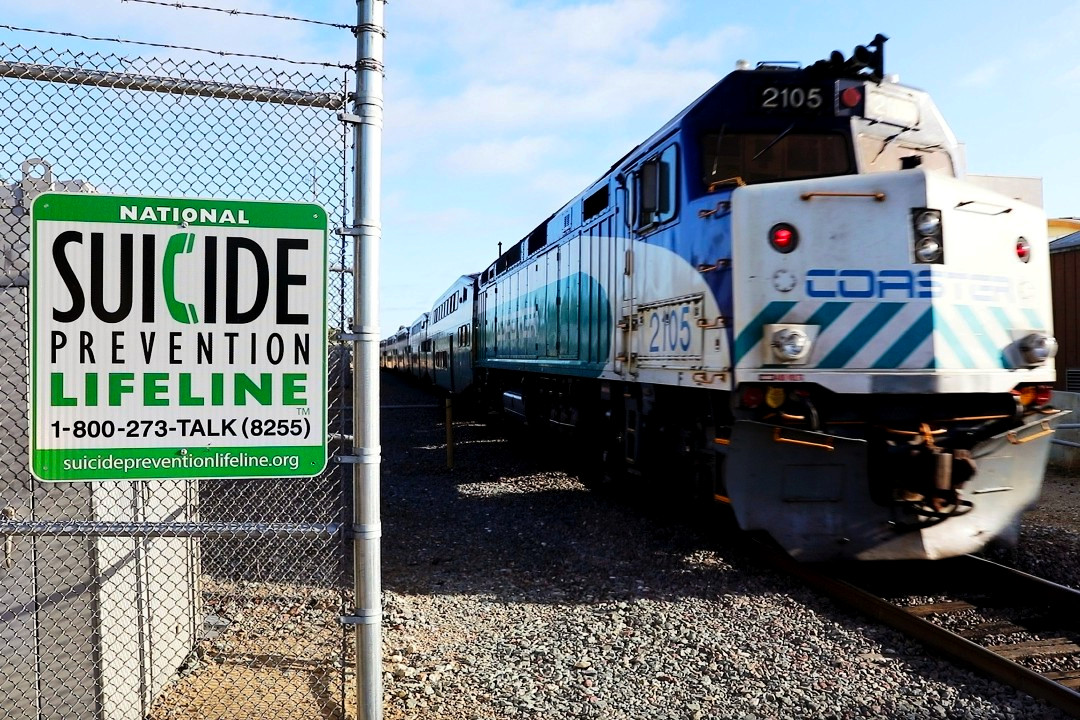 Suicide prevention sign railroad tracks