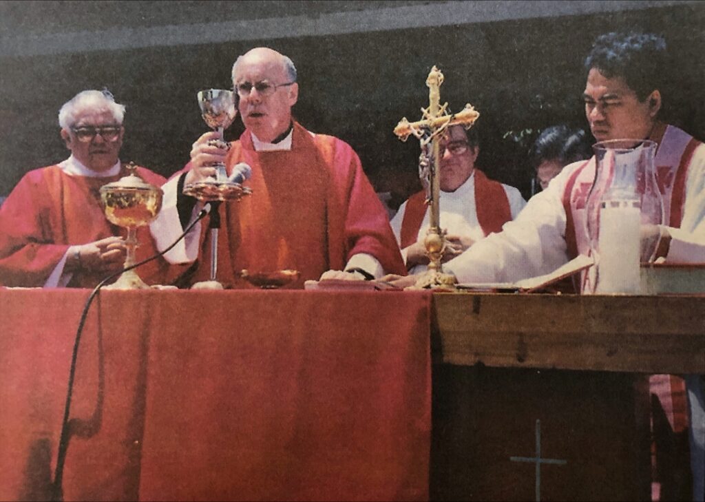 Father Gregory Studerus celebrates Mass at St. Bridget Church / Resurrection Parish in 2001.
