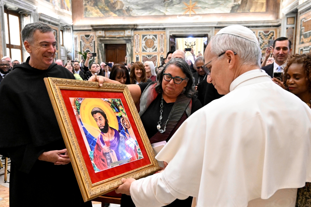 Pope Leo presented with portrait of St Augustine