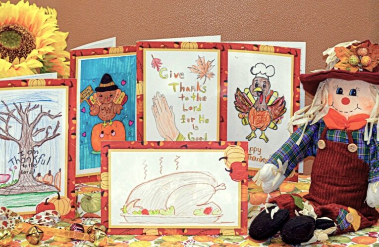 Kids craft holiday cards to thank Cardinal Tobin for scholarships