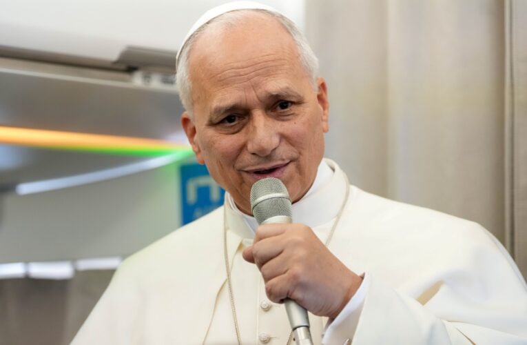 Pope tells reporters dialogue is always the answer to tense situations