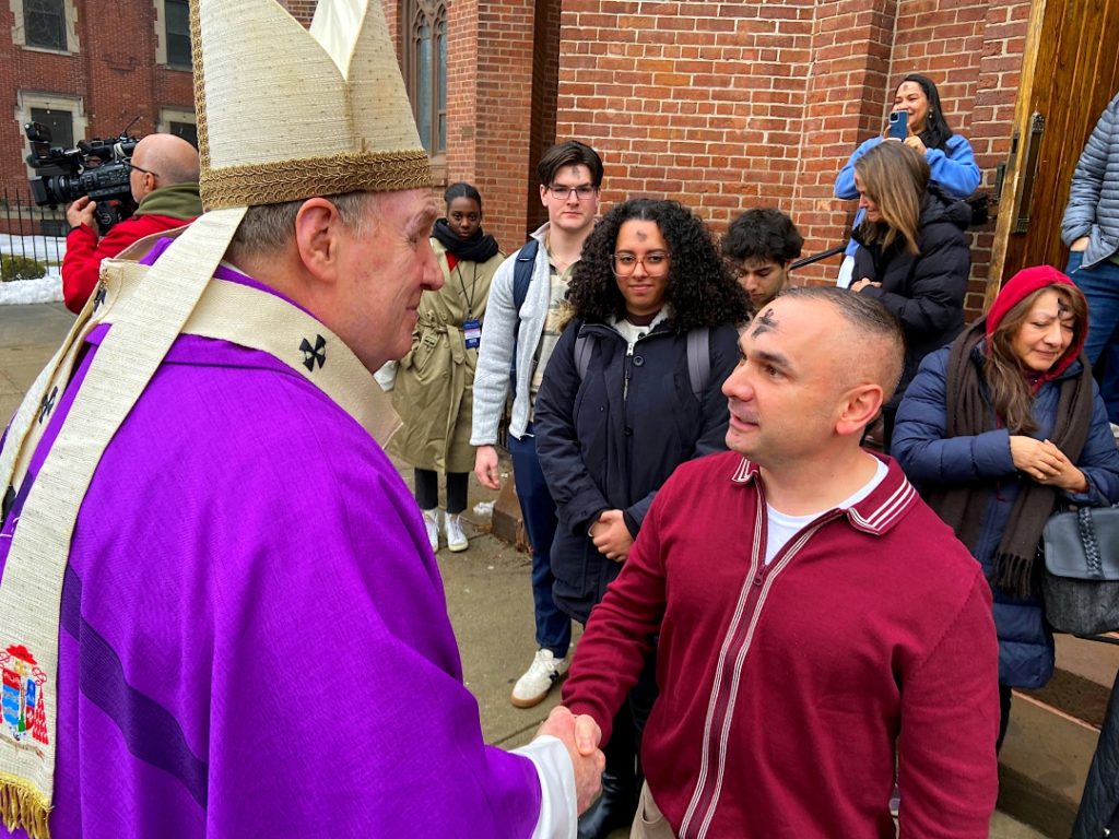 AWSP - Young man greeting Cardinal Tobin