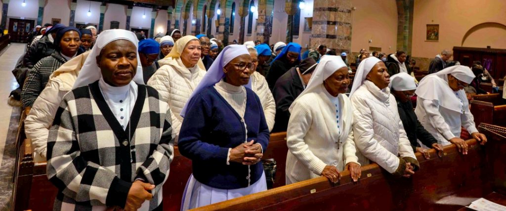 CLM - SISTERS IN FRONT PEW