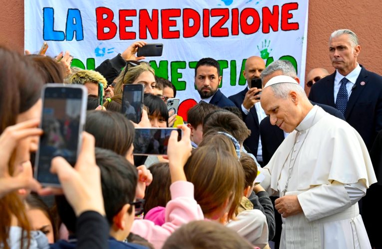 Pope greets children in visit to Church of St Mary of the Presentation Rome