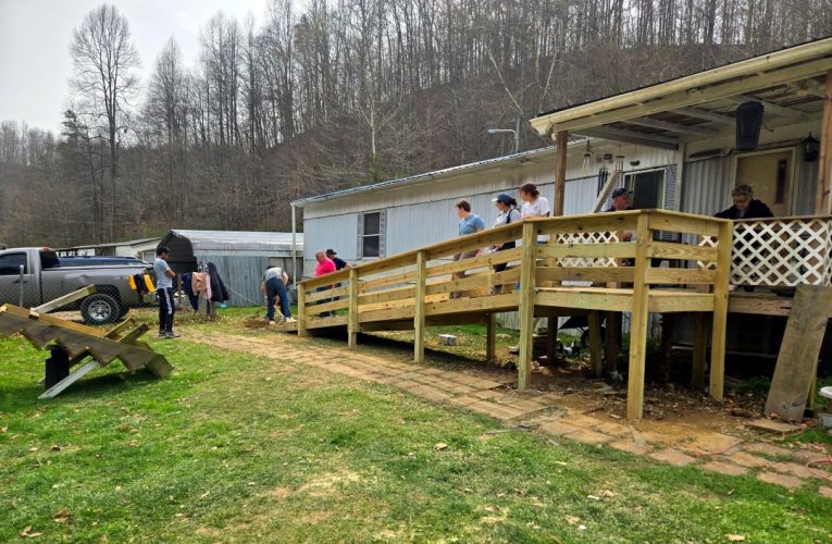 KMT - Wide shot of students building ramp