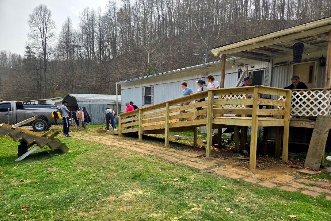 KMT - Wide shot of students building ramp