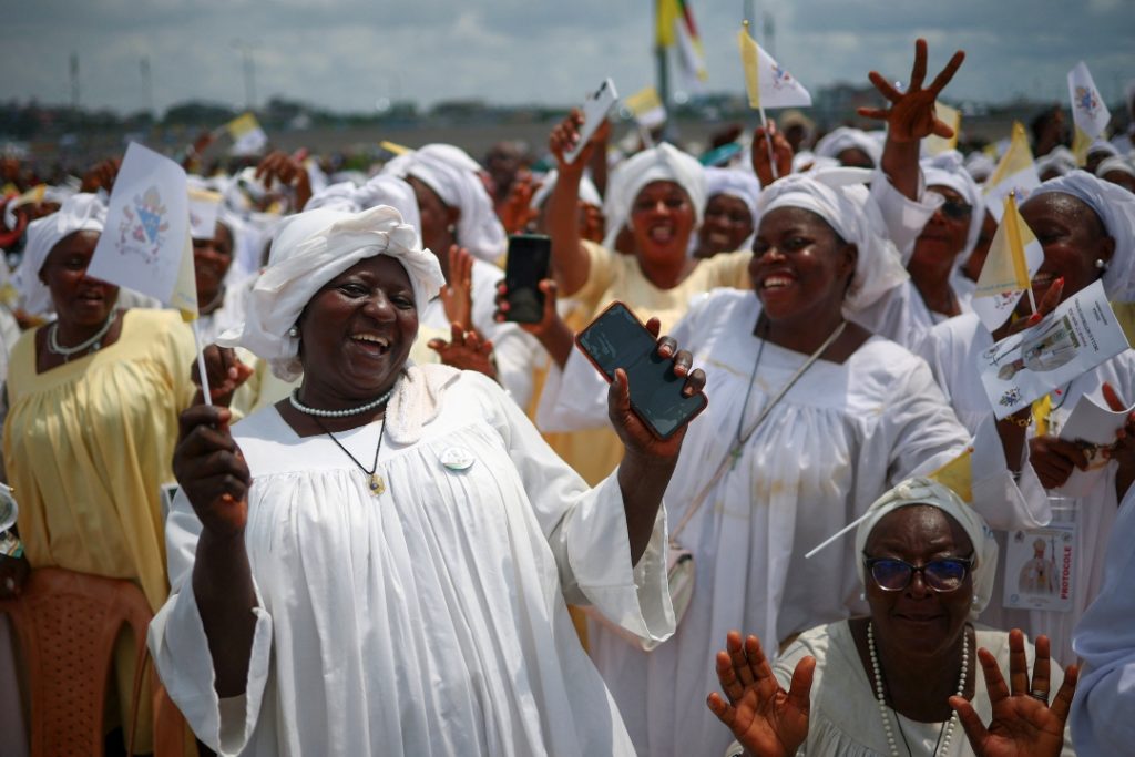PMC - People rejoicing during papal Mass at Japoma Stadium in Douala Cameroon