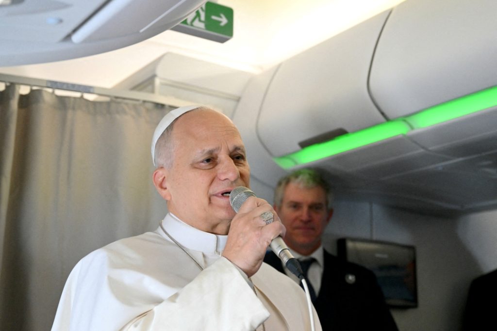Pope addresses media during flight to Algiers