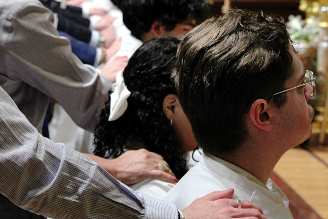Seton Hall Students receive sacraments April 12