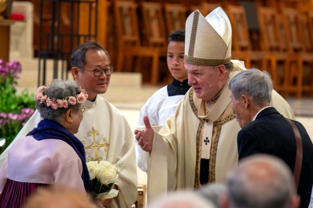 WAM 26 - Cardinal Tobin greets couples