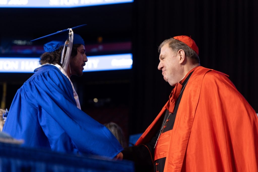 UG26 - Cardinal Tobin congratulates graduate