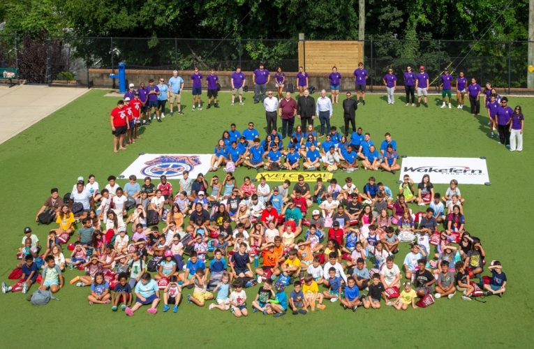 CYOC - Group shot of Cardinal Tobin with campers and staff