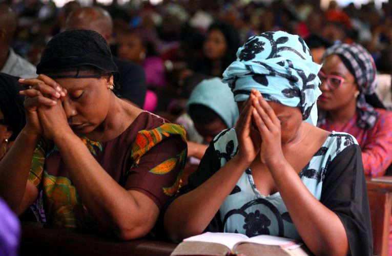 Women praying in Nigeria