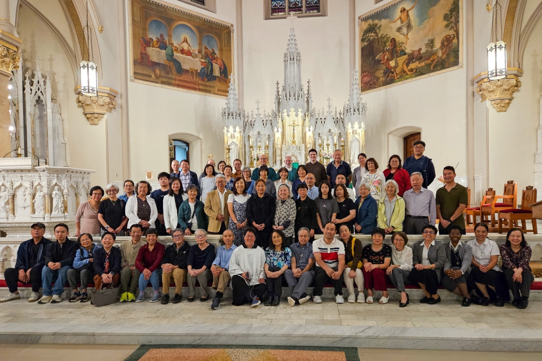 CCMF - Chinese Catholic community poses in church