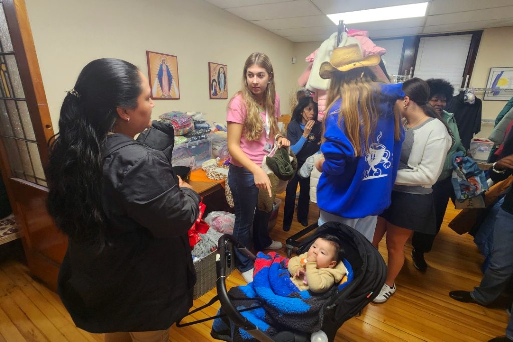 MHCG - Mercy house coat giveaway w volunteer