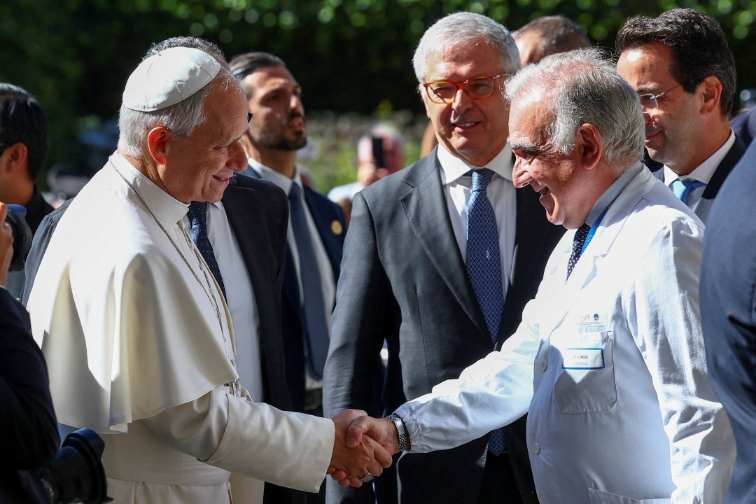 Pope Leo XIV greeted by Dr Andrea Cambieri at Rome's Gemelli Hospital Oct 13